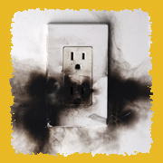 Electrical fire behing outlet